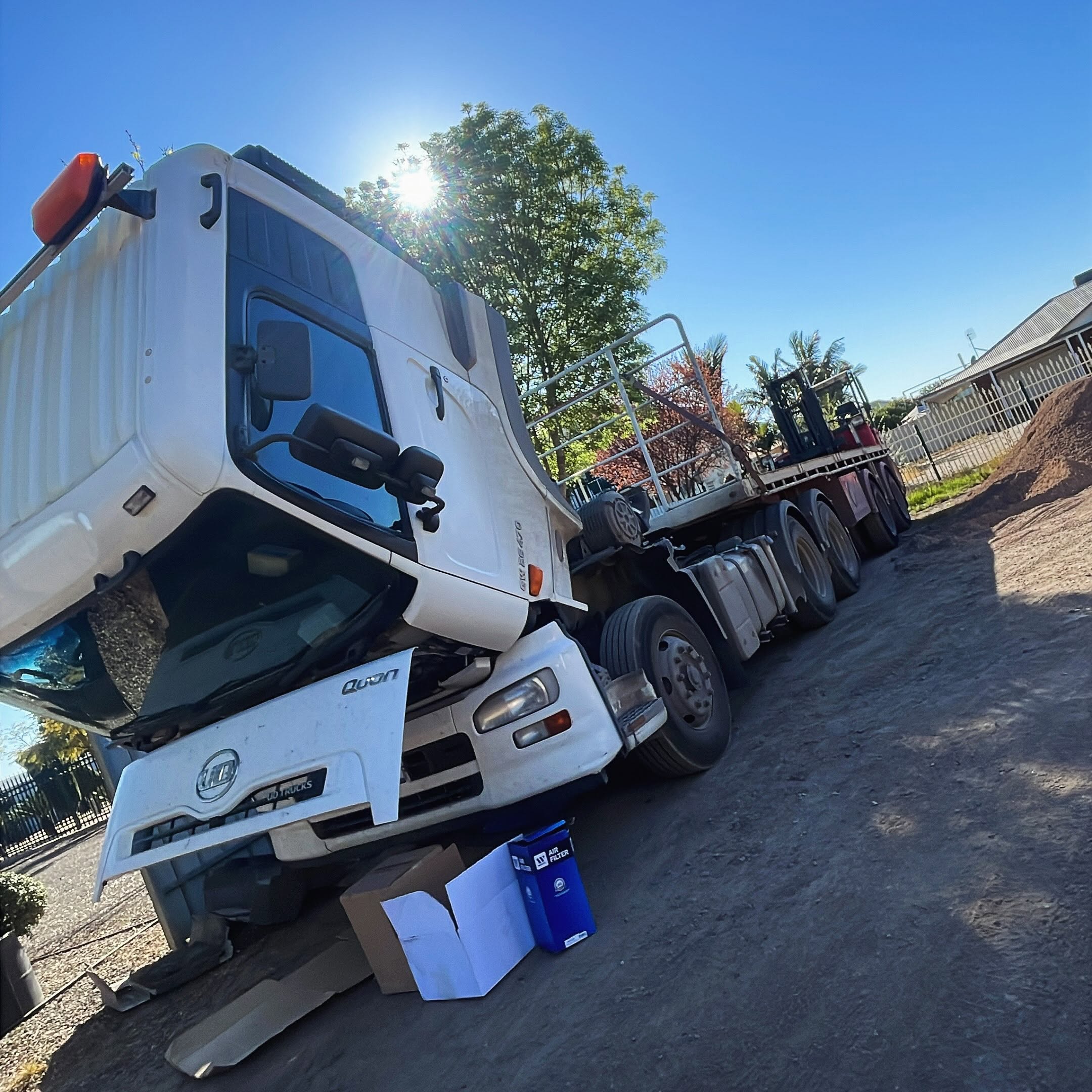 UD Quon prime mover tilted cab engine service on hardstand